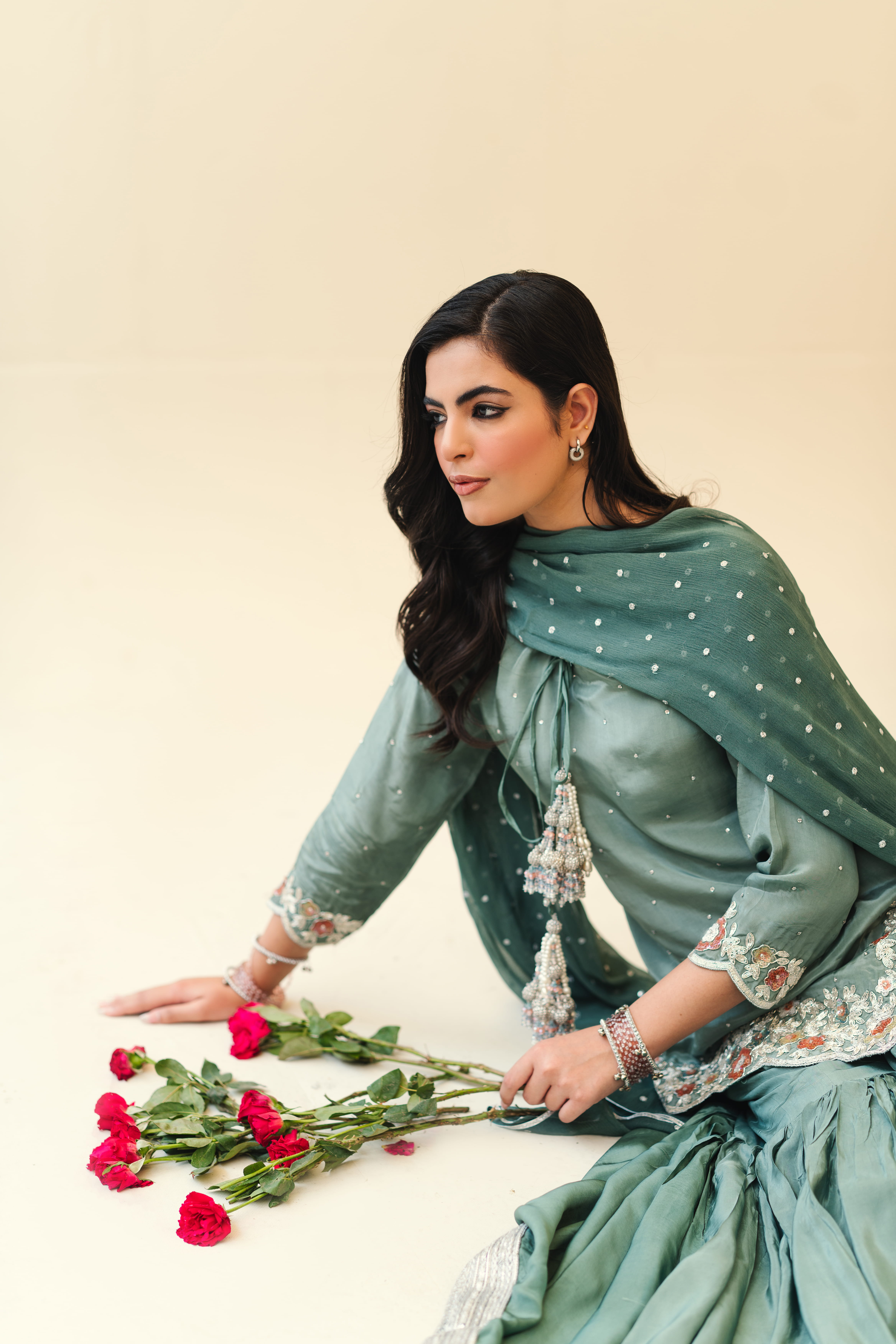 Mahtab, seated
